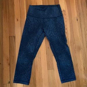 A pair of Lululemon patterned cropped leggings